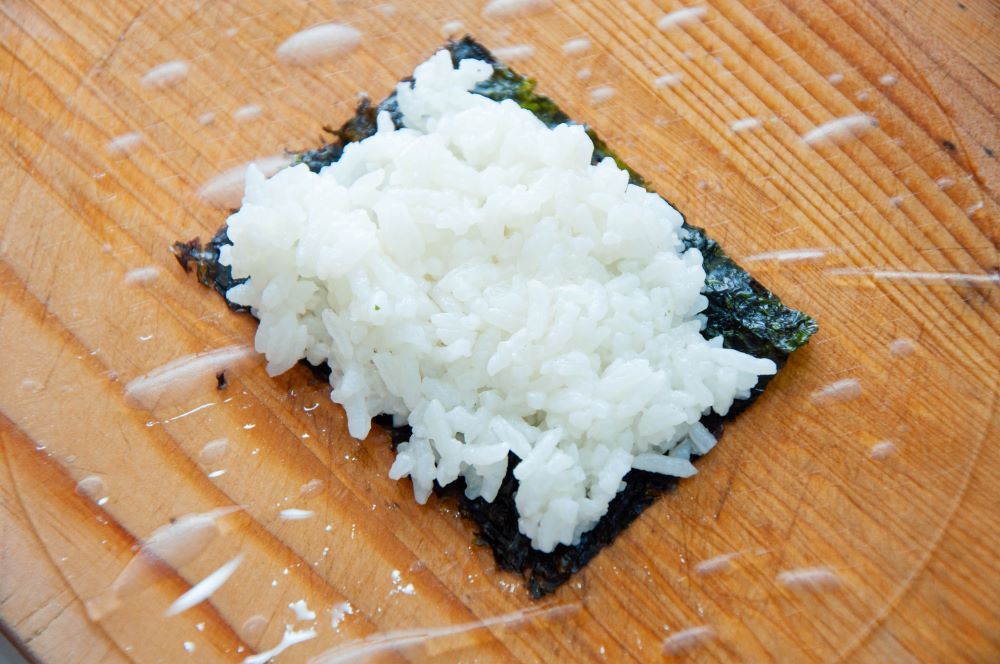 Placing the rice on nori sheet
