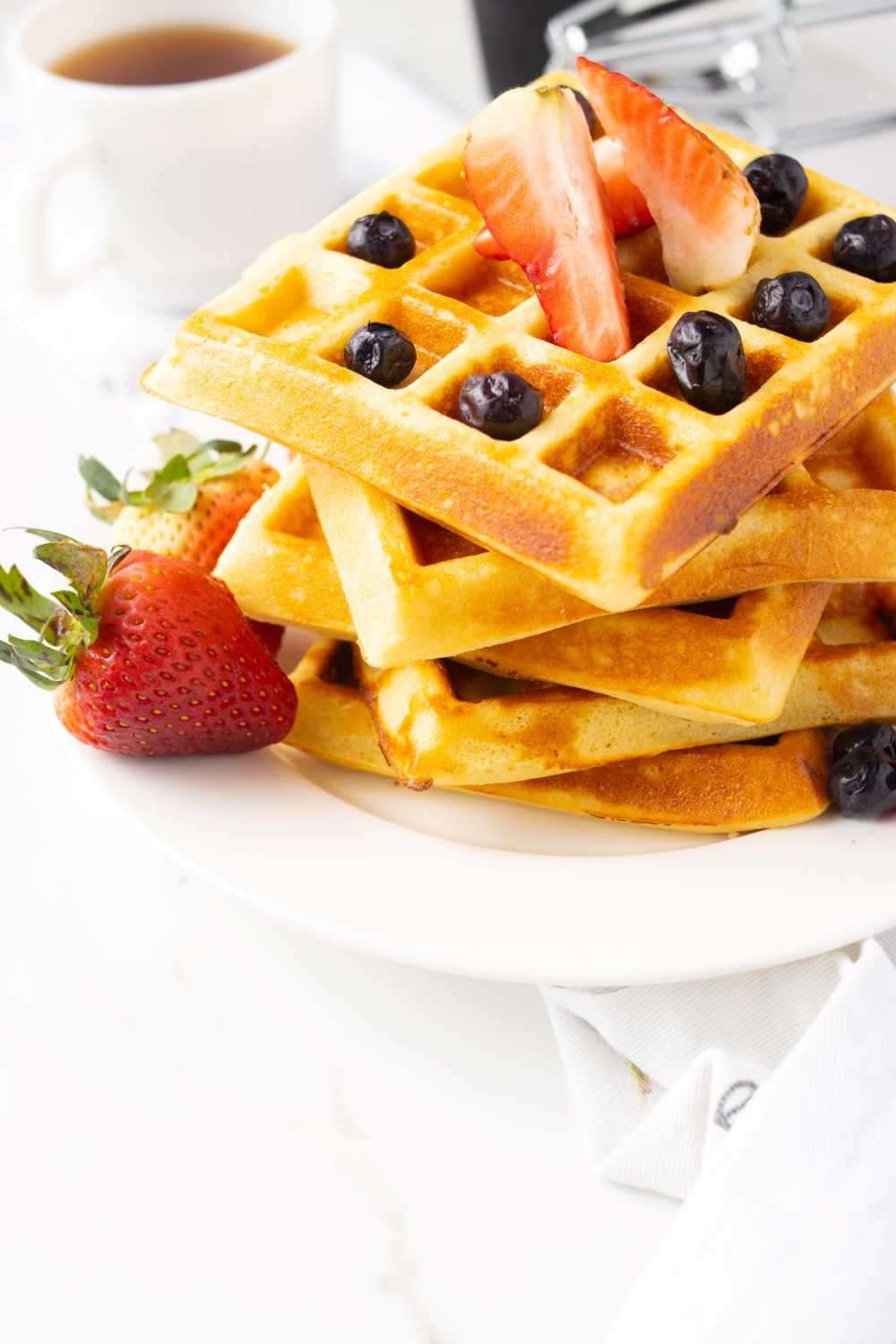 Keto Almond Flour Waffles with berries on top