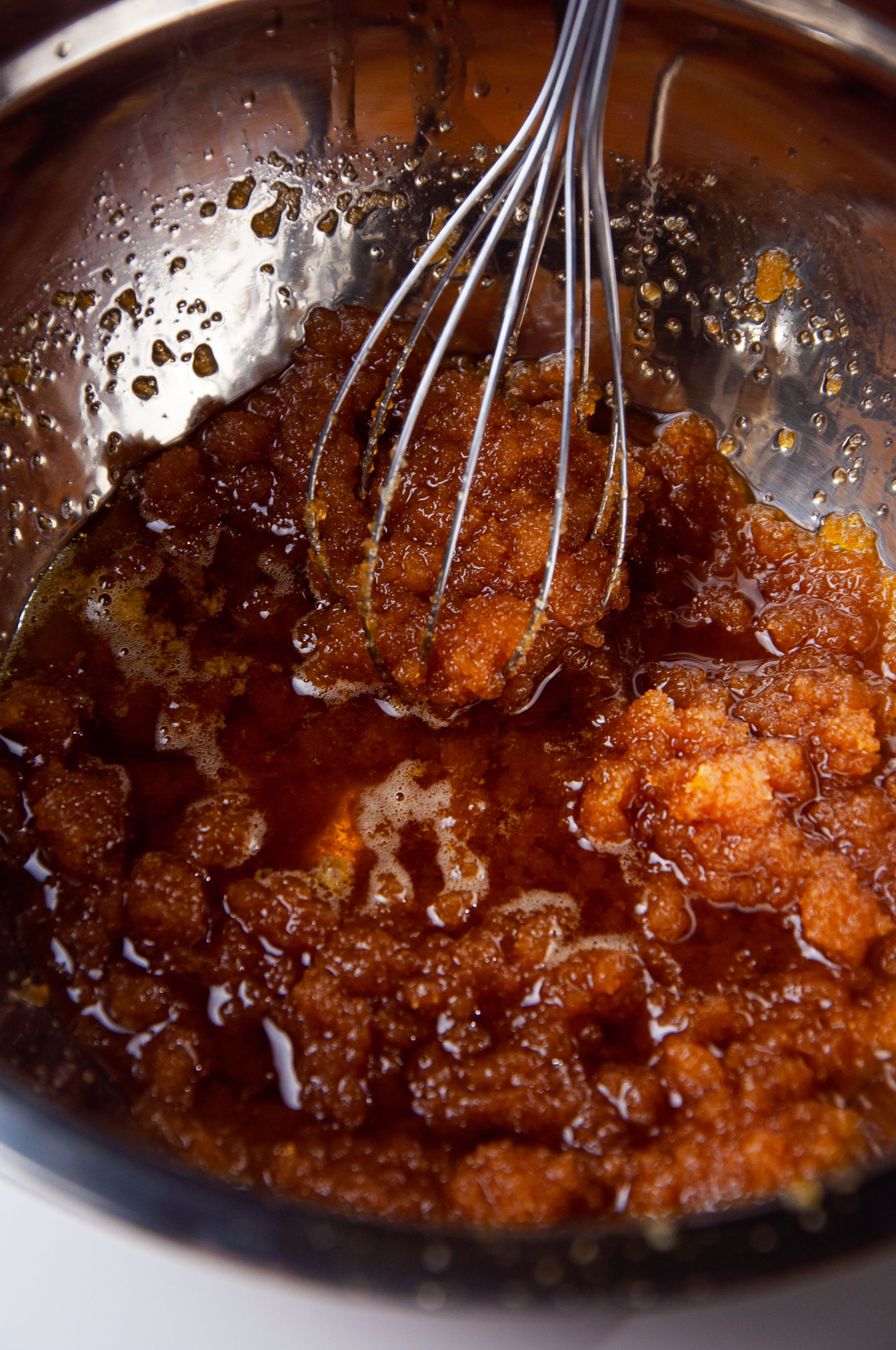 Combining the golden-brown butter with salt and sugar mixture