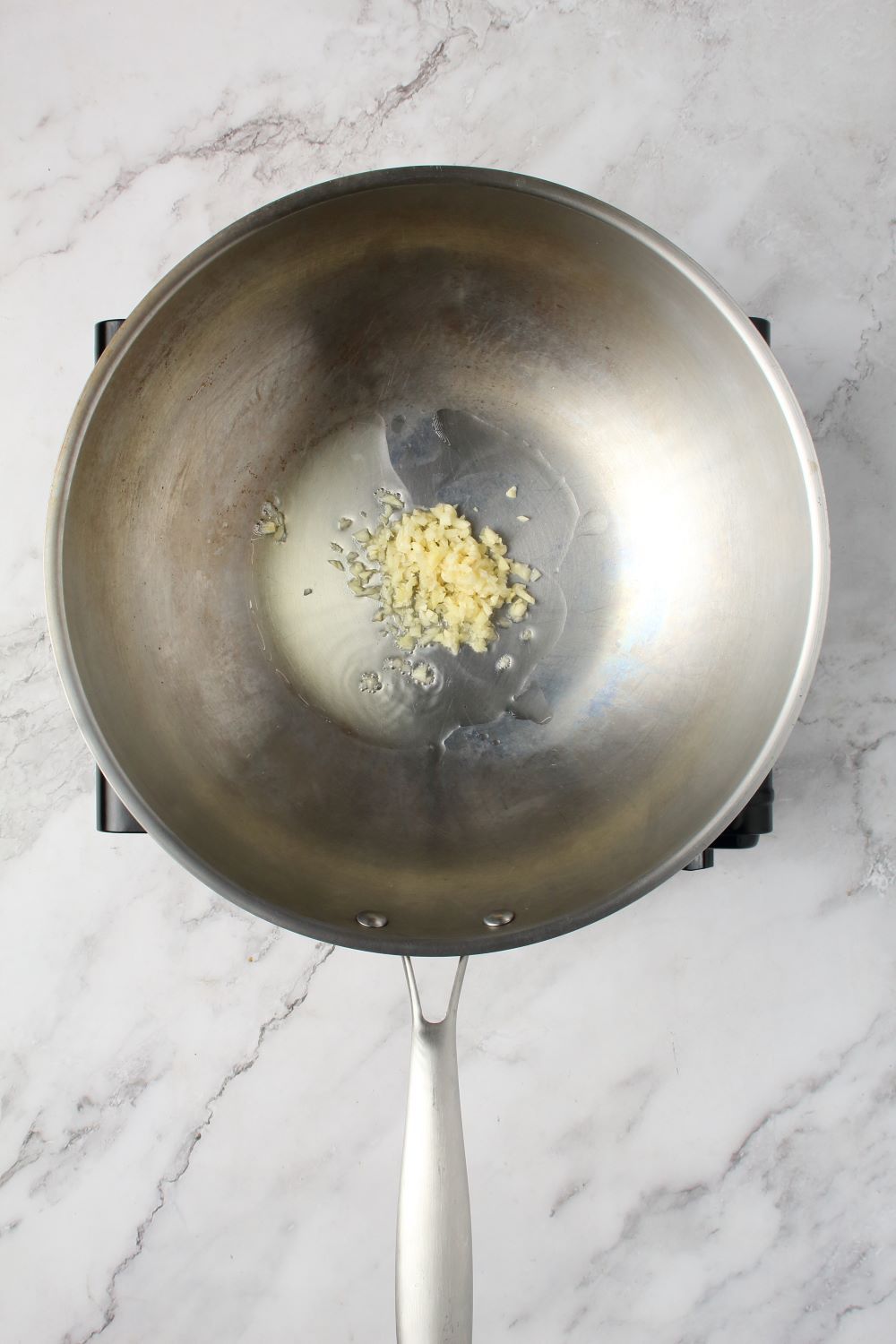 Adding the minced garlic